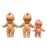 Set of 3 Kewpie dolls (green feather, soft vinyl)