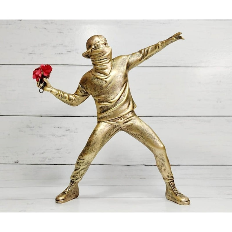 "Banksy/Boy Throwing Away Flowers Figure, Bronze"