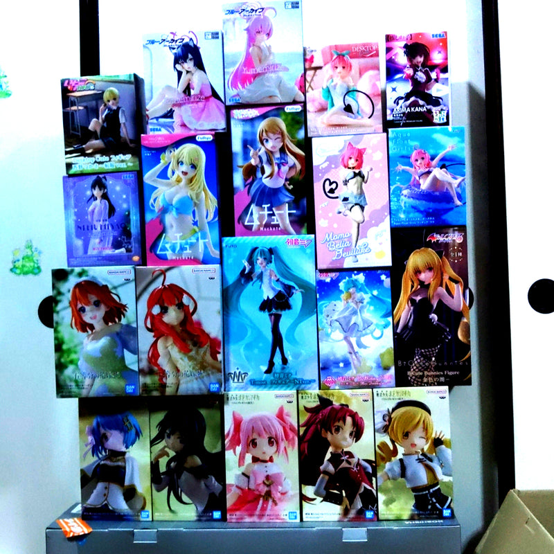 A bundle of 20 figures for sale, including Miku, Madoka, To Love-Ru, etc.
