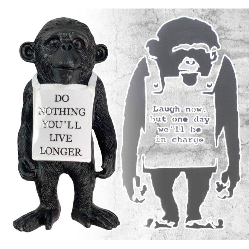 Banksy Laugh Now figure with sticker...