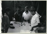 1990 Press Photo Children from Haiti play board game - noc89280 Model