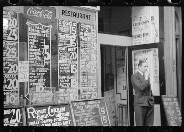 Photo:Baltimore Maryland 1939 restaurant sign menu board street scene man Model