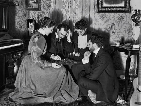 ANTIQUE GLASS PLATE NEGATIVE:  COUPLES PLAYING A BOARD GAME IN THE MUSIC ROOM Model