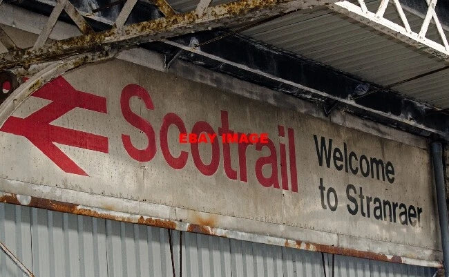 PHOTO  ADVERTISING BOARD - STRANRAER STATION - (3) A RUSTING WELCOME FROM SCOTRA Model