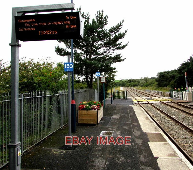 PHOTO  ELECTRONIC DISPLAY BOARD ON PLATFORM 1 LLANGENNECH RAILWAY STATION THIS P Model
