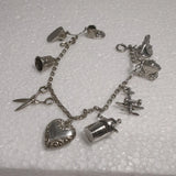 Vintage Sterling Silver Movable charm Bracelet heart thimble scissors airplane Charms