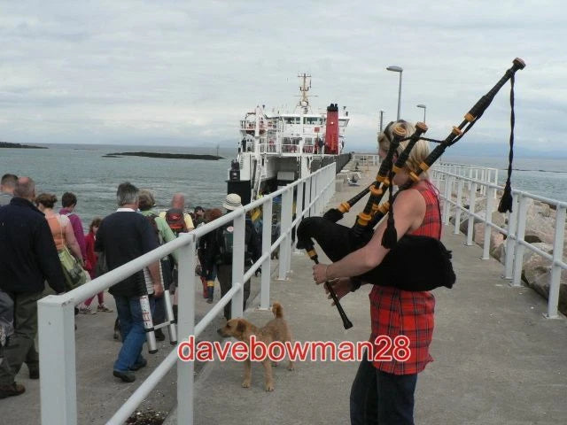 PHOTO  ISLE OF EIGG: SERENADED DEPARTURE PASSENGERS BOARD THE FERRY BACK TO THE Model