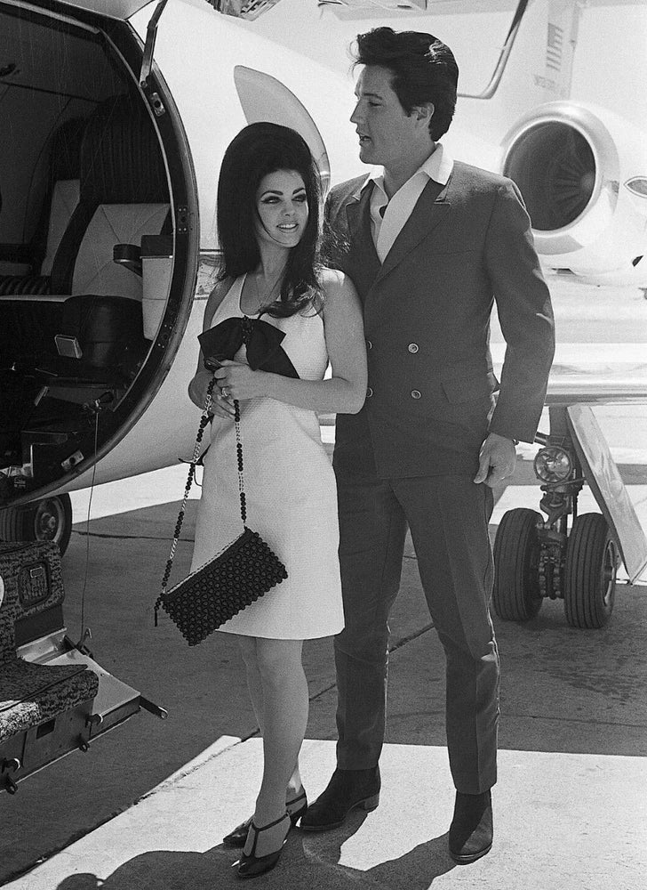 Elvis Presley and Priscilla Boarding Plane in Las Vegas Photo 5" x 7" Model