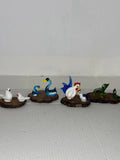 Set of 4 small glass animal figurines on wood bases Model