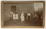 Antique Photo on Board of Children in front of Building Some in Costumes 8
