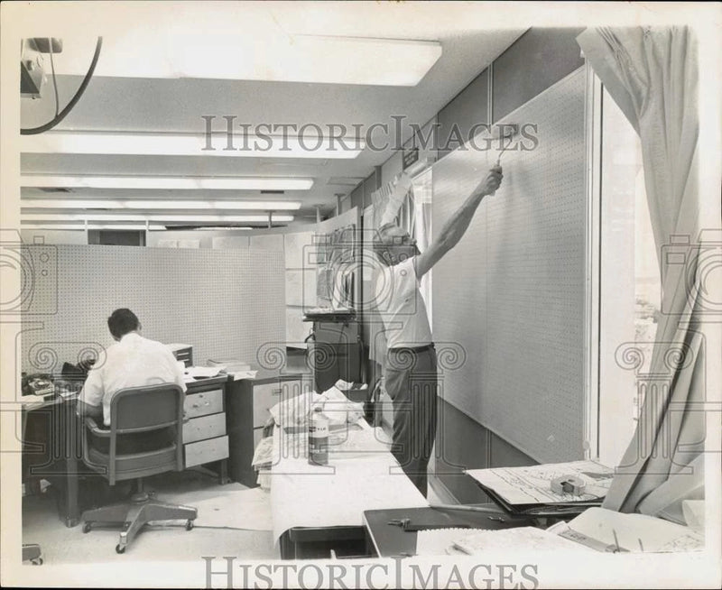 1968 Press Photo Gil Clark and worker painting board at Hurricane Center, Miami Model