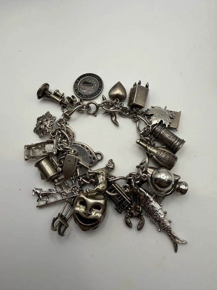Vintage 925 Sterling Silver  Charm Bracelet Fully loaded With 25 CHARMS - 104grm Charms