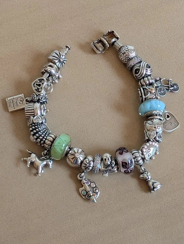 Pandora and Chamilia charm bracelet with 25 charms Charms