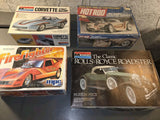 Set of 4 Model Cars - some are partially assembled Model