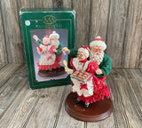 Santa Steals A Kiss & A Cookie Holiday Display On Wooden Base KSA Collectibles Model