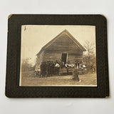 Antique Group Photograph On Board Leaning House Church Man Woman Dog Odd Model