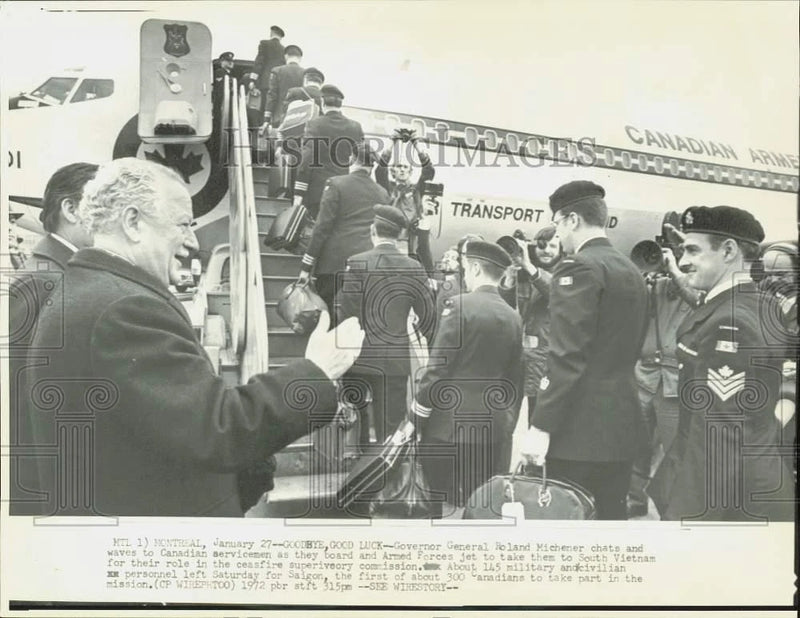 1972 Press Photo Roland Michener waves as officers board jet en route to Vietnam Model