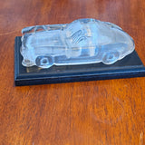 Clear Glass Car Figurine on Black Wooden Display Base 3D Effect Glossy Finish Model