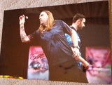 ryan searle throws the dart at the board during the match signed 12x8 photo Model