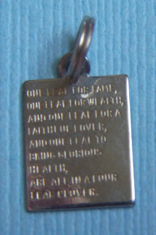 Vintage four leaf clover saying silver tone charm Charms