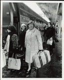 1977 Press Photo Inauguration-bound travelers board South Station Amtrak train Model
