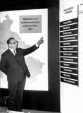Berlin's Governing Mayor Albertz points to a large display board S- Old Photo 1 Model