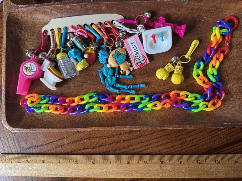 Vintage 1980's Plastic Clip On Bell Charm Necklace 13 Charms Skeleton Rainbow Charms