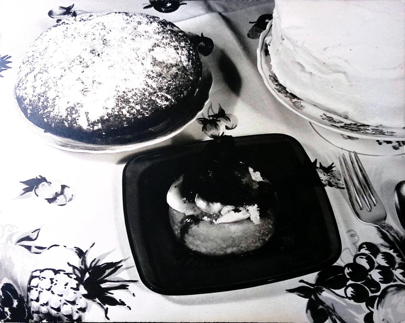 Vintage Art Board Photograph Dessert Display on a Floral Tablecloth in Black and Model