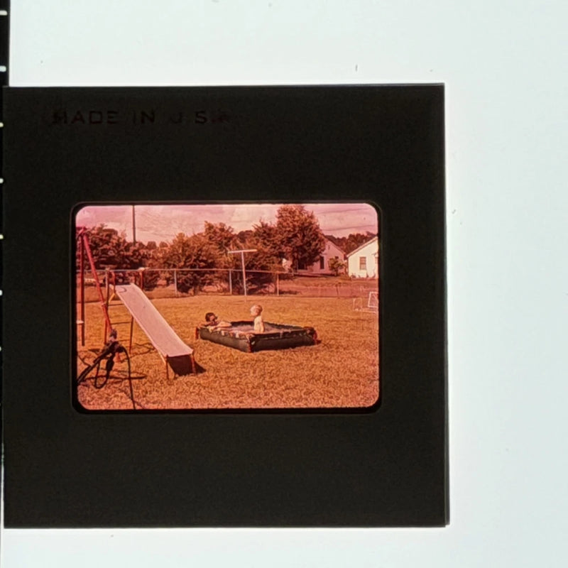 Two Children Backyard Wading Pool Swing Set Summer 1950s Color Film Slide Model