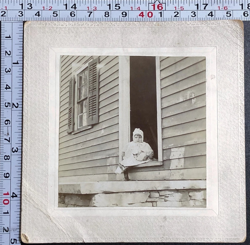 Victorian Board Mounted Antique Photograph - Scared Child Sitting in Doorway Model