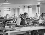 General view a drawing office draughtsmen behind drawing boards ro Old Photo Model