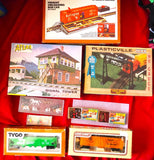 Miscellaneous new H O building kits, cars, and accessories as pictured! Model