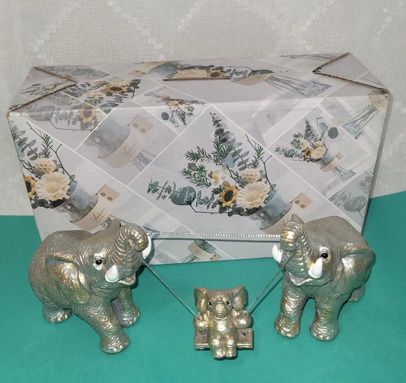 TOHLUCS-Statue-Featuring 2 Adult Elephants Holding a Swing with a Baby Elephant Model