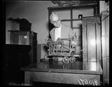 Photo:1936 Inventor Elderly Man Working on Mechanical Toy Model Workshop Model