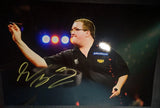 stephen bunting throws a dart at the board during the match signed 12x8 photo Model