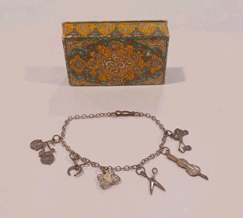 Antique Sterling Silver Charm Bracelet With Sterling Charms Articulating Signed Charms