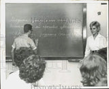 1963 Press Photo A student writing on the board in a classroom in Cuba Model