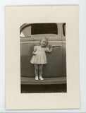 Little girl in dress on running boards of automobile car vintage  photo Model