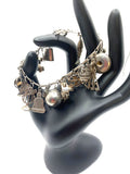 Vintage 19 piece sterling charm bracelet Charms