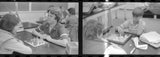 Negative photo strip school boys girls playing chess board game boy mouth taped Model