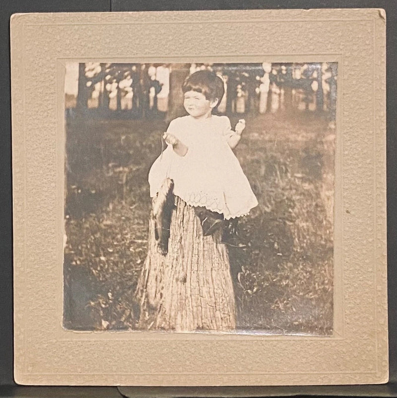 Little Girl Sitting on Tree Stump Outdoors Early Photo Mounted on Board Model