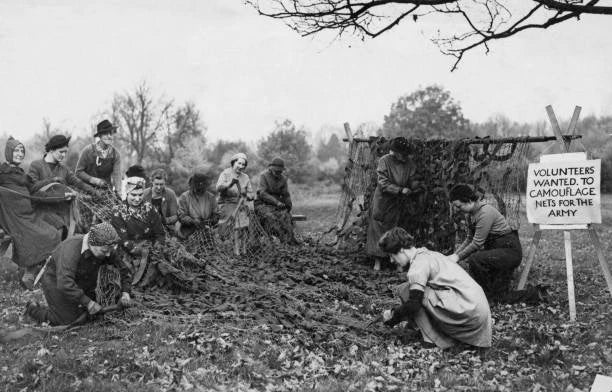 Group women help war effort by making camouflage nets, a board an  Old Photo Model