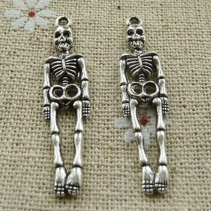 Free Ship 100 pcs tibetan silver skull charms pendant 39x9mm L-324 Charms
