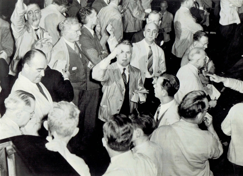 1948 Wire Photo stock traders working on the floor of the Chicago Board of Trade Model