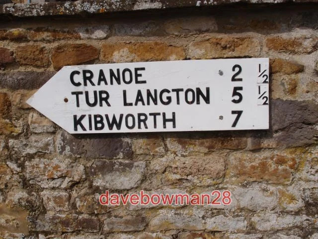 PHOTO  DESTINATION SIGN ON THE CHURCH WALL WOODEN BOARD WITH NUMBERS AND LETTERS Model