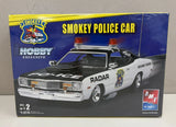 AMT 38515 Smokey 1976 Dodge Dart Police Car Highway Patrol Factory Sealed 1:25 Model