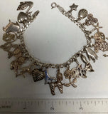 Sterling Silver Charm Bracelet 8¡± 21 Sterling Charms  32 Grams Charms