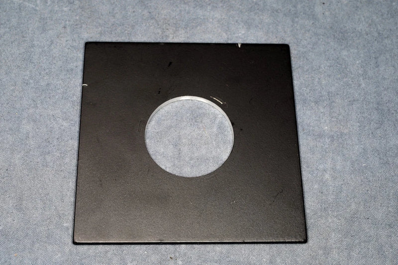 This Beseler 39mm 4x4"lens board works  with 23C, 45, and CB7-series enlargers Model