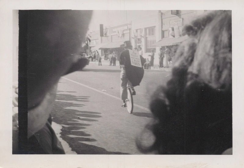 Man Riding Unicycle with Sandwich Board Sign "I BUY TIRES" VINTAGE PHOTO odd fun Model