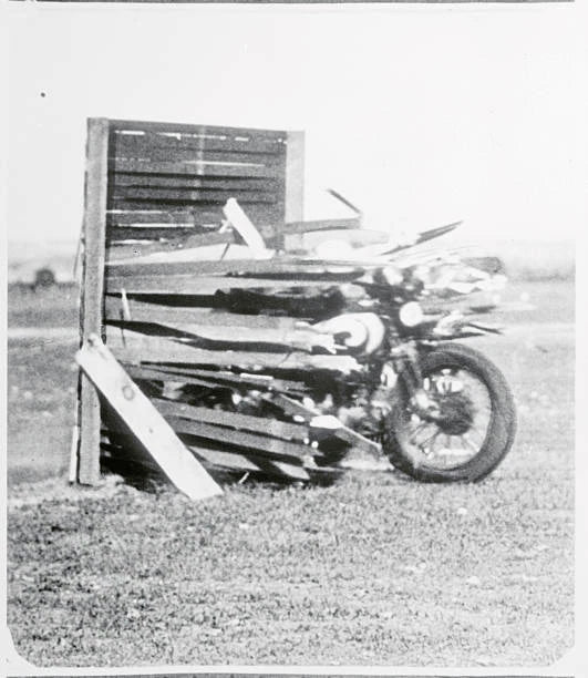 Motorcycle Crashing Through Fence 1933 Photo Going Through A Board Fence at 70 Model